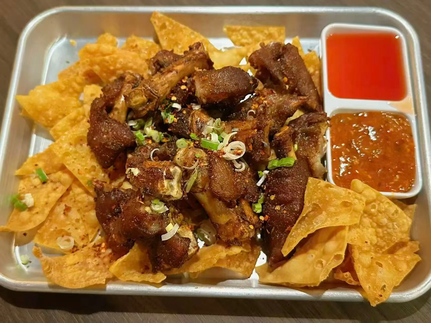 Crispy spiced braised pork trotters with fried wonton chips and two dipping sauces at 面滋味 Tasty Noodle House, a Chinese Restaurant in Plano